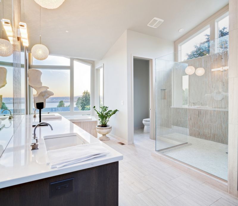 Modern residential bathroom renovation with walk-in shower