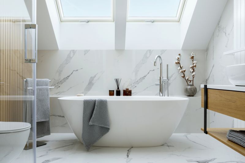 Luxury bathroom with freestanding bathtub and marble finishes